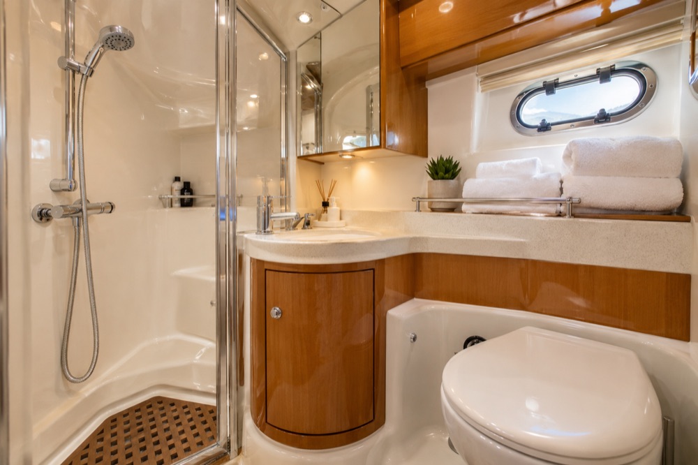 Hot shower and bathroom on the yacht Sunny Day
